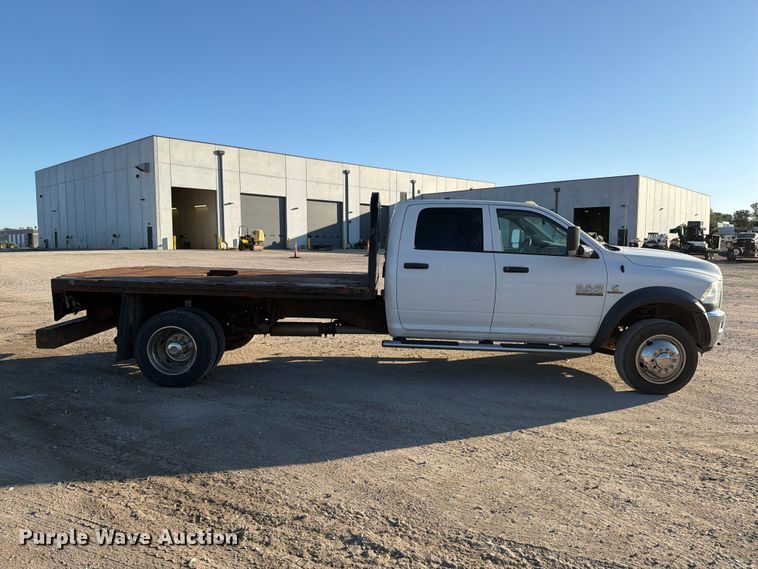 image for item EX1028 2016 RAM 5500 Crew Cab flatbed truck