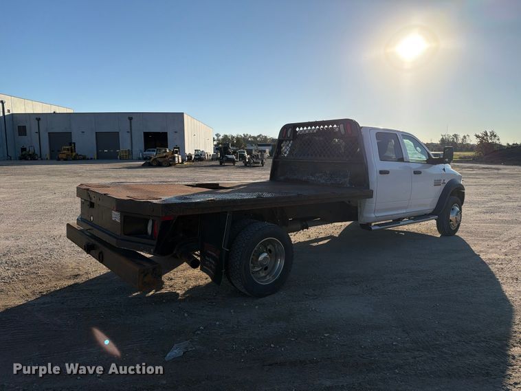 image for item EX1028 2016 RAM 5500 Crew Cab flatbed truck