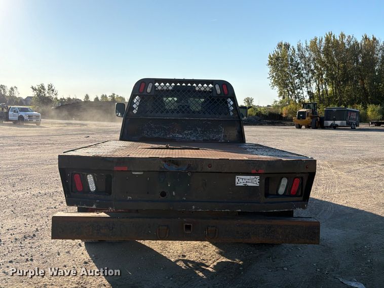 image for item EX1028 2016 RAM 5500 Crew Cab flatbed truck
