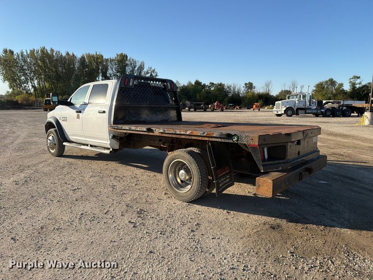 image for item EX1028 2016 RAM 5500 Crew Cab flatbed truck