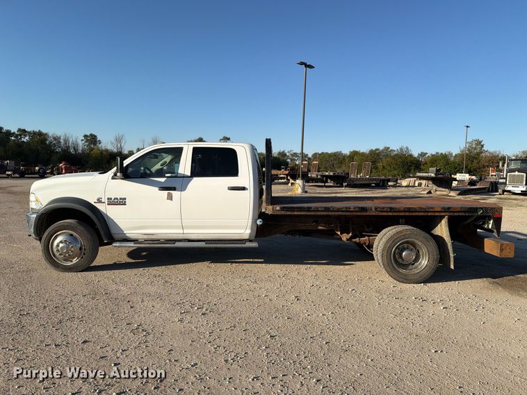 image for item EX1028 2016 RAM 5500 Crew Cab flatbed truck