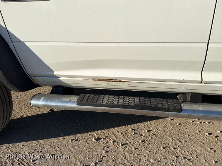 image for item EX1028 2016 RAM 5500 Crew Cab flatbed truck