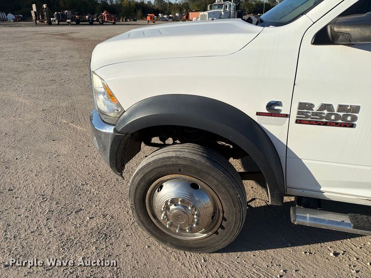image for item EX1028 2016 RAM 5500 Crew Cab flatbed truck