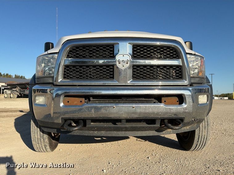 image for item EX1028 2016 RAM 5500 Crew Cab flatbed truck