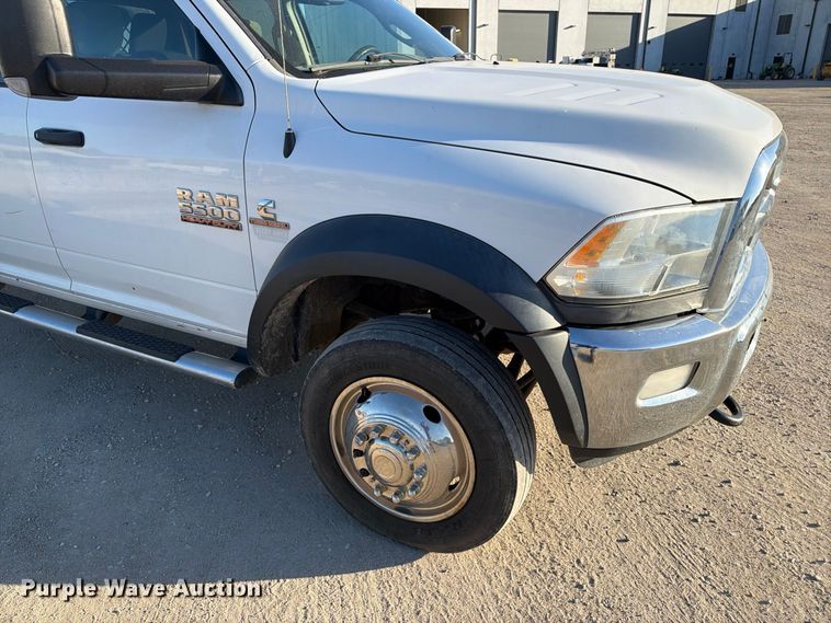 image for item EX1028 2016 RAM 5500 Crew Cab flatbed truck