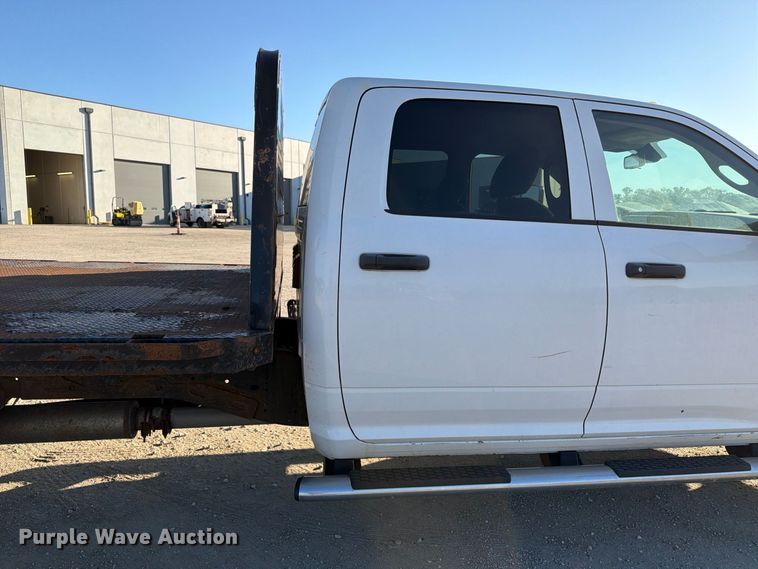 image for item EX1028 2016 RAM 5500 Crew Cab flatbed truck