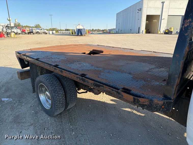image for item EX1028 2016 RAM 5500 Crew Cab flatbed truck