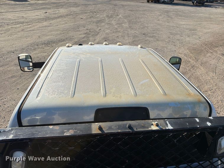 image for item EX1028 2016 RAM 5500 Crew Cab flatbed truck