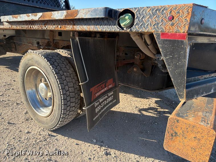 image for item EX1028 2016 RAM 5500 Crew Cab flatbed truck