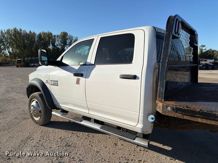 image for item EX1028 2016 RAM 5500 Crew Cab flatbed truck