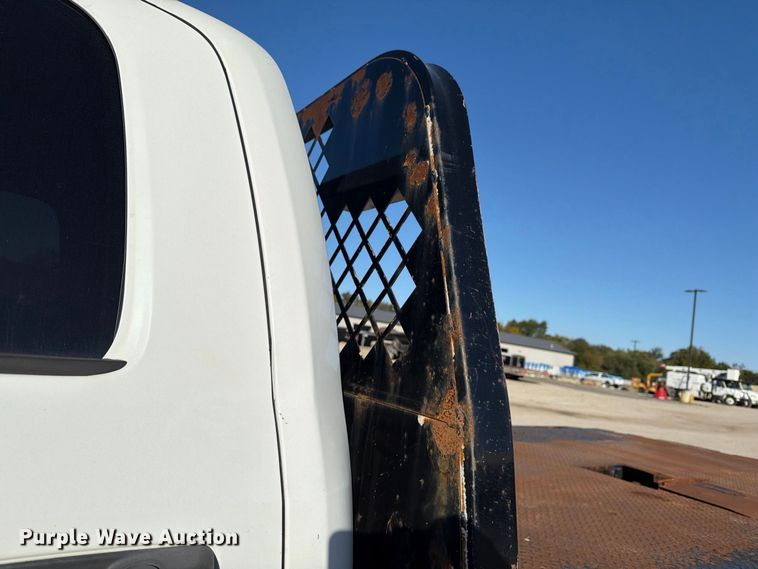 image for item EX1028 2016 RAM 5500 Crew Cab flatbed truck