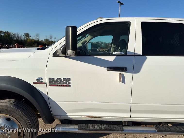 image for item EX1028 2016 RAM 5500 Crew Cab flatbed truck