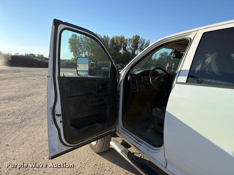 image for item EX1028 2016 RAM 5500 Crew Cab flatbed truck