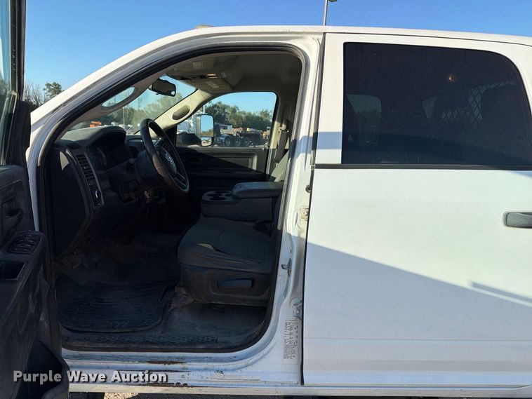image for item EX1028 2016 RAM 5500 Crew Cab flatbed truck
