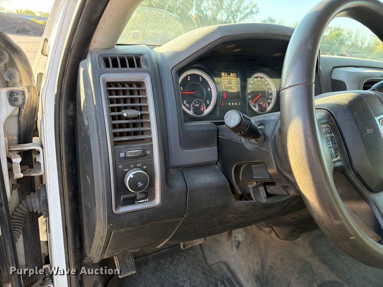 image for item EX1028 2016 RAM 5500 Crew Cab flatbed truck