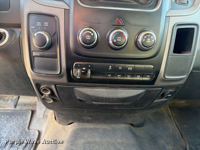 image for item EX1028 2016 RAM 5500 Crew Cab flatbed truck