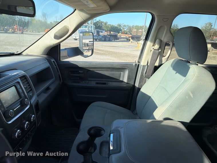 image for item EX1028 2016 RAM 5500 Crew Cab flatbed truck