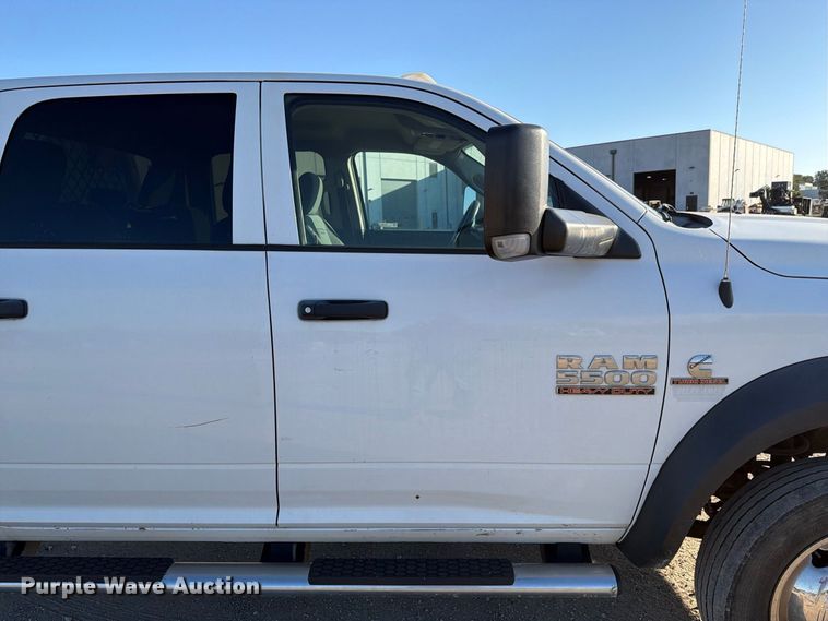 image for item EX1028 2016 RAM 5500 Crew Cab flatbed truck