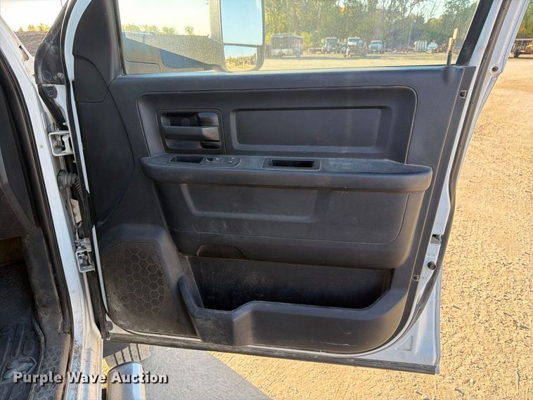 image for item EX1028 2016 RAM 5500 Crew Cab flatbed truck