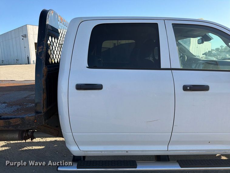 image for item EX1028 2016 RAM 5500 Crew Cab flatbed truck