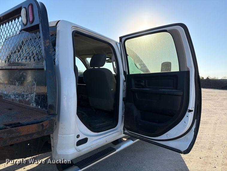 image for item EX1028 2016 RAM 5500 Crew Cab flatbed truck