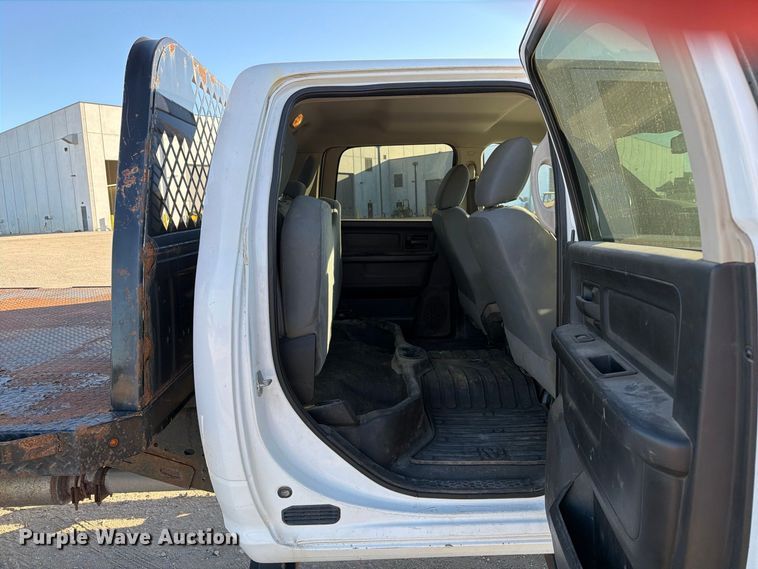 image for item EX1028 2016 RAM 5500 Crew Cab flatbed truck