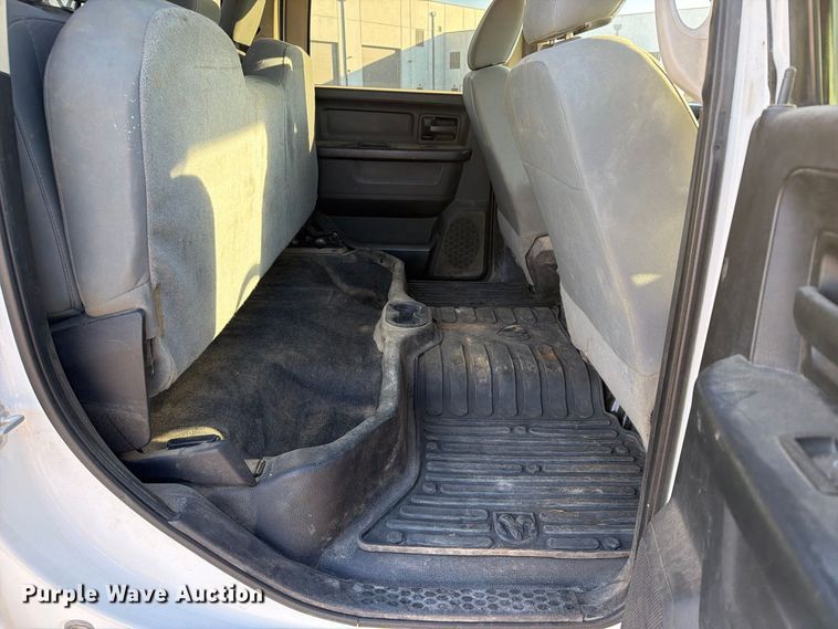 image for item EX1028 2016 RAM 5500 Crew Cab flatbed truck