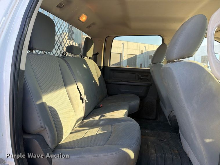 image for item EX1028 2016 RAM 5500 Crew Cab flatbed truck