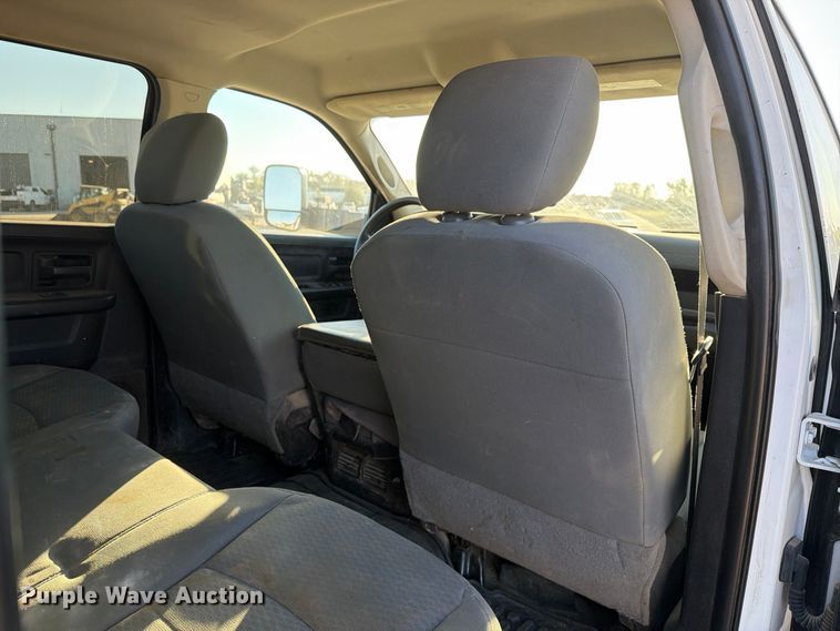 image for item EX1028 2016 RAM 5500 Crew Cab flatbed truck