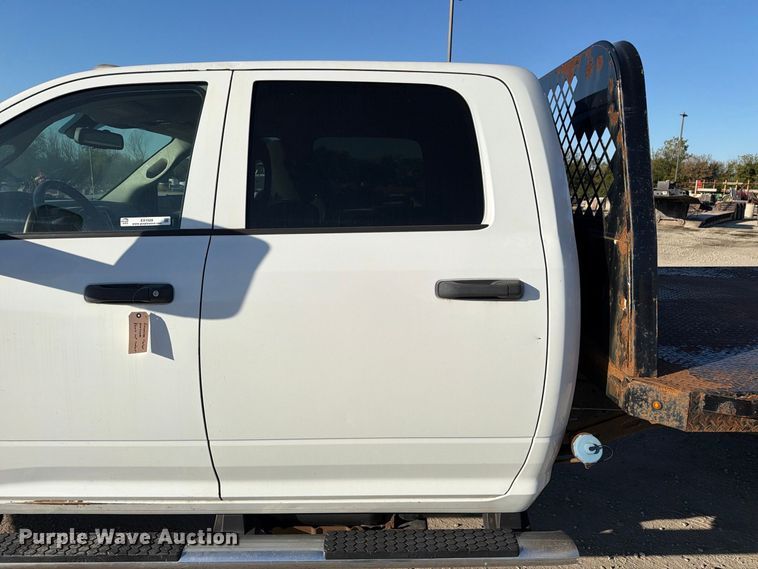 image for item EX1028 2016 RAM 5500 Crew Cab flatbed truck