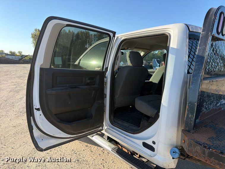 image for item EX1028 2016 RAM 5500 Crew Cab flatbed truck