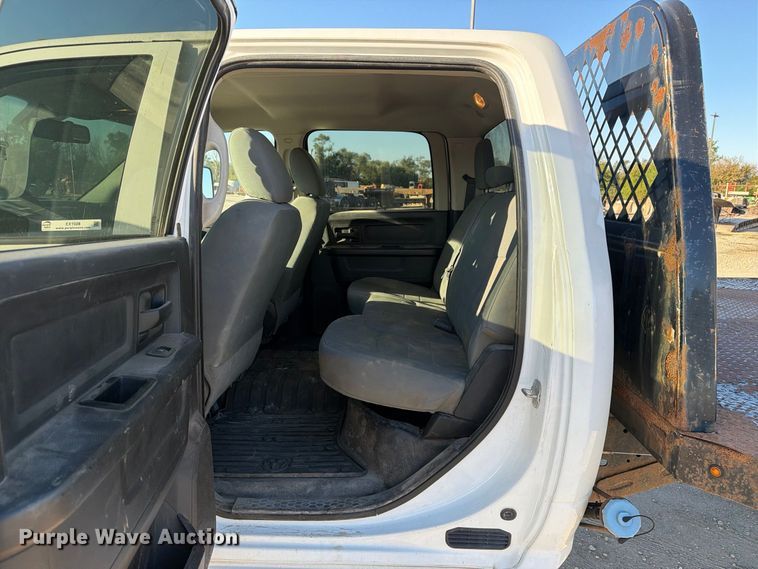 image for item EX1028 2016 RAM 5500 Crew Cab flatbed truck