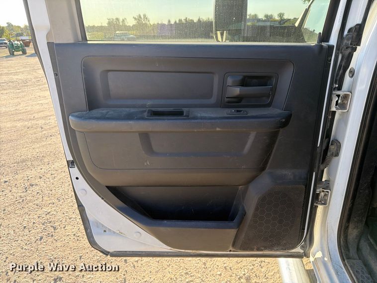 image for item EX1028 2016 RAM 5500 Crew Cab flatbed truck