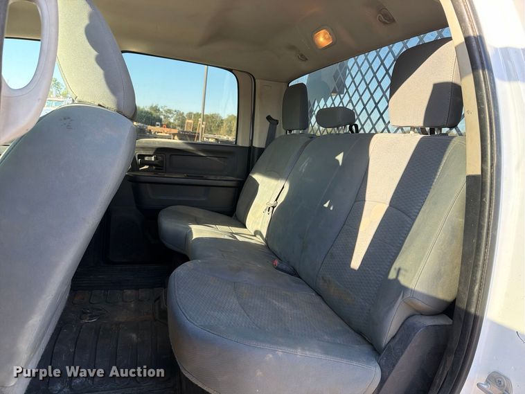 image for item EX1028 2016 RAM 5500 Crew Cab flatbed truck