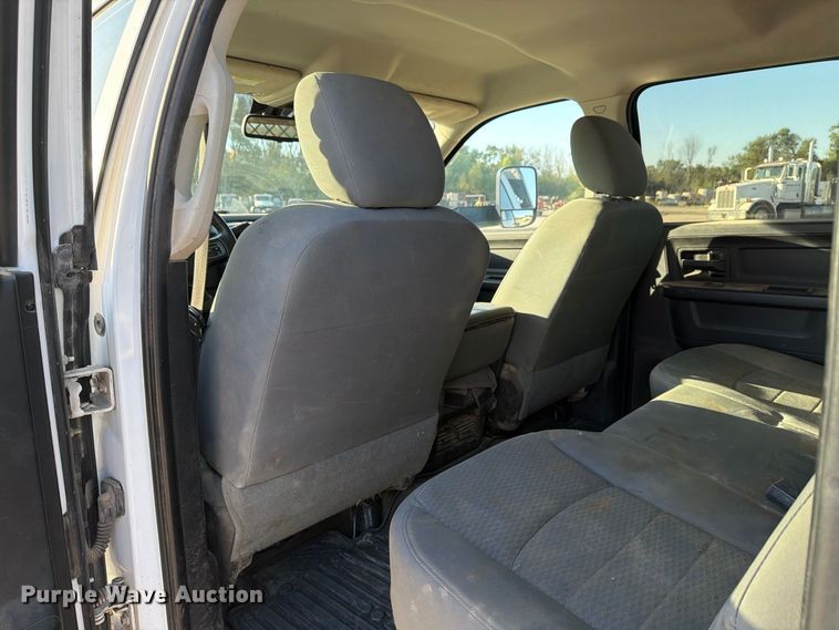 image for item EX1028 2016 RAM 5500 Crew Cab flatbed truck