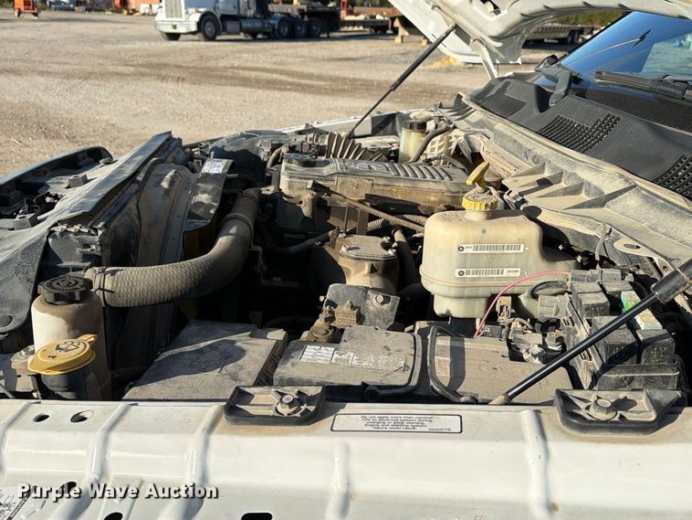 image for item EX1028 2016 RAM 5500 Crew Cab flatbed truck