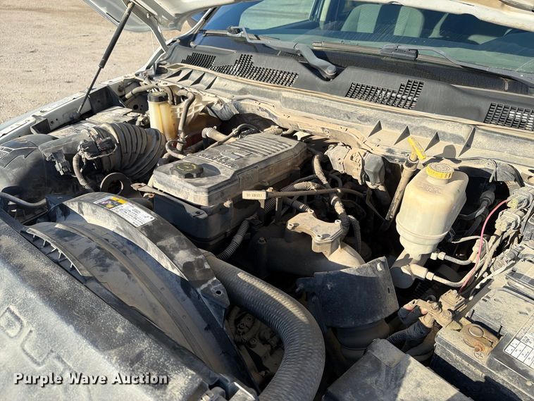 image for item EX1028 2016 RAM 5500 Crew Cab flatbed truck