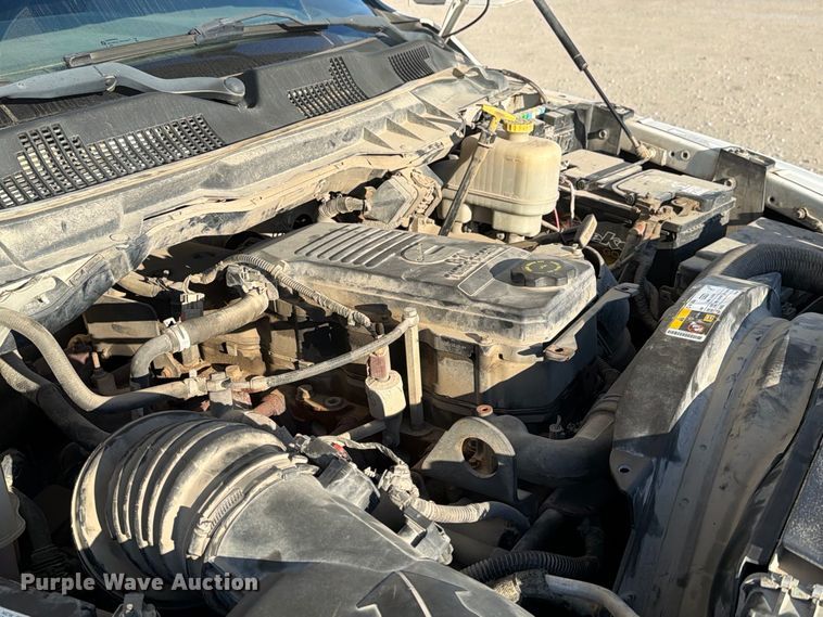 image for item EX1028 2016 RAM 5500 Crew Cab flatbed truck