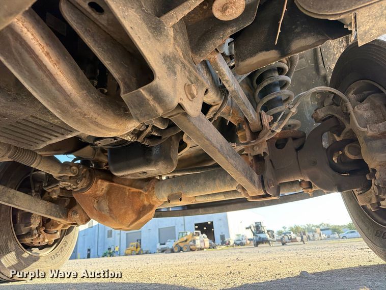 image for item EX1028 2016 RAM 5500 Crew Cab flatbed truck