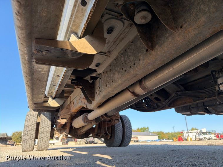 image for item EX1028 2016 RAM 5500 Crew Cab flatbed truck