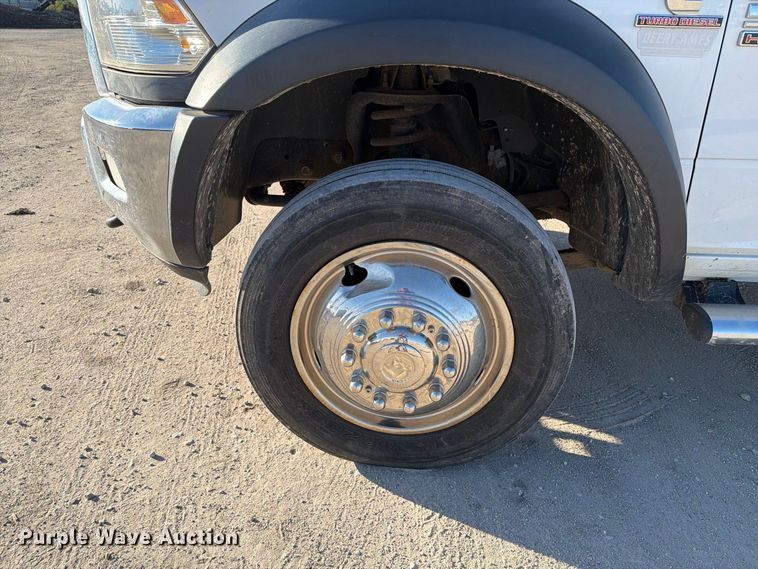 image for item EX1028 2016 RAM 5500 Crew Cab flatbed truck