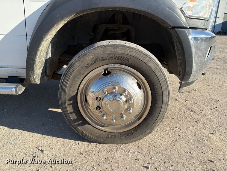 image for item EX1028 2016 RAM 5500 Crew Cab flatbed truck