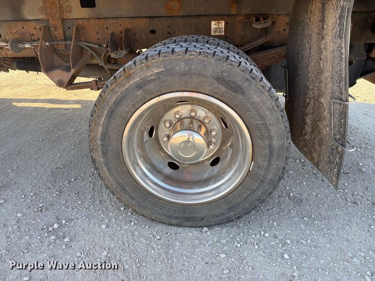 image for item EX1028 2016 RAM 5500 Crew Cab flatbed truck
