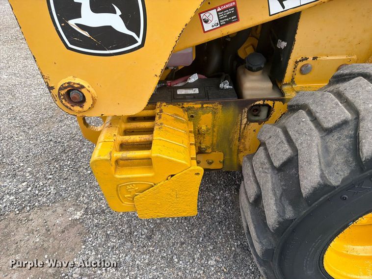 image for item FW3512 2005 John Deere 320E skid steer loader