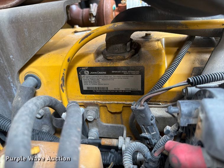 image for item FW3512 2005 John Deere 320E skid steer loader