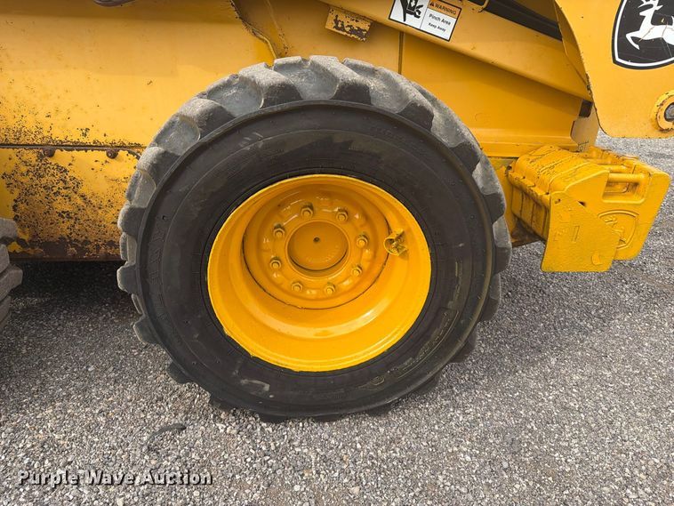 image for item FW3512 2005 John Deere 320E skid steer loader