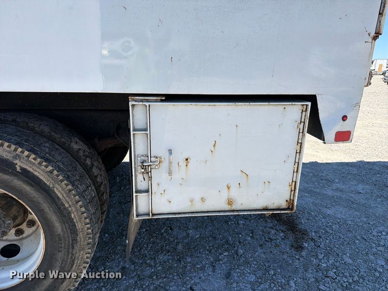 image for item YA3708 2015 Ford  F750 Super Duty Ext. Cab chipper truck