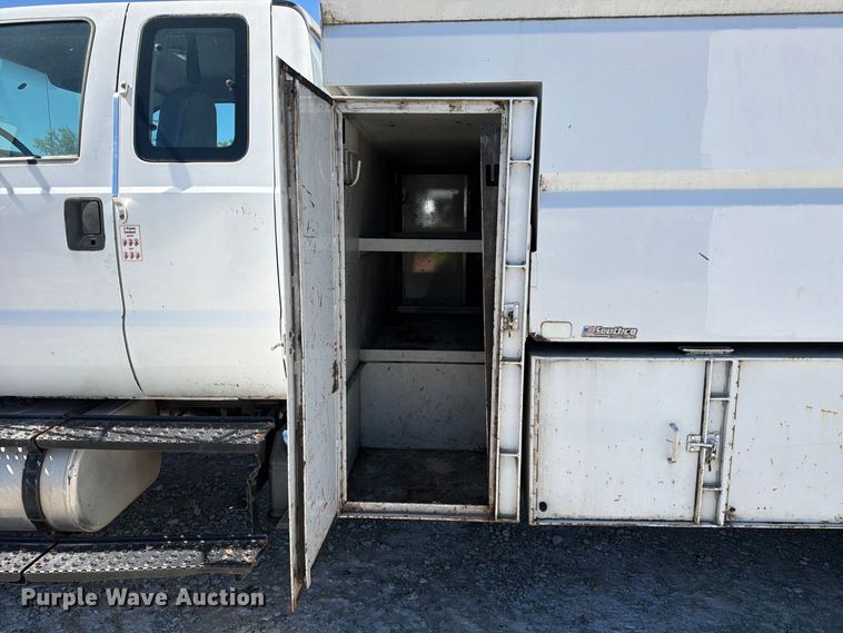 image for item YA3708 2015 Ford  F750 Super Duty Ext. Cab chipper truck