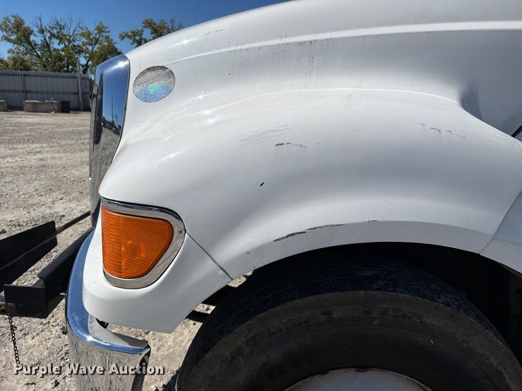 image for item YA3708 2015 Ford  F750 Super Duty Ext. Cab chipper truck
