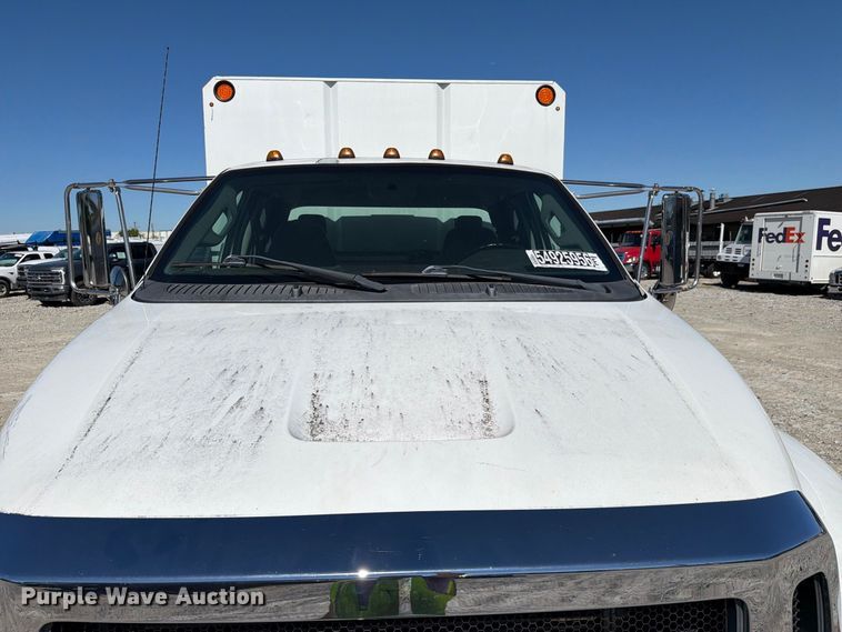 image for item YA3708 2015 Ford  F750 Super Duty Ext. Cab chipper truck